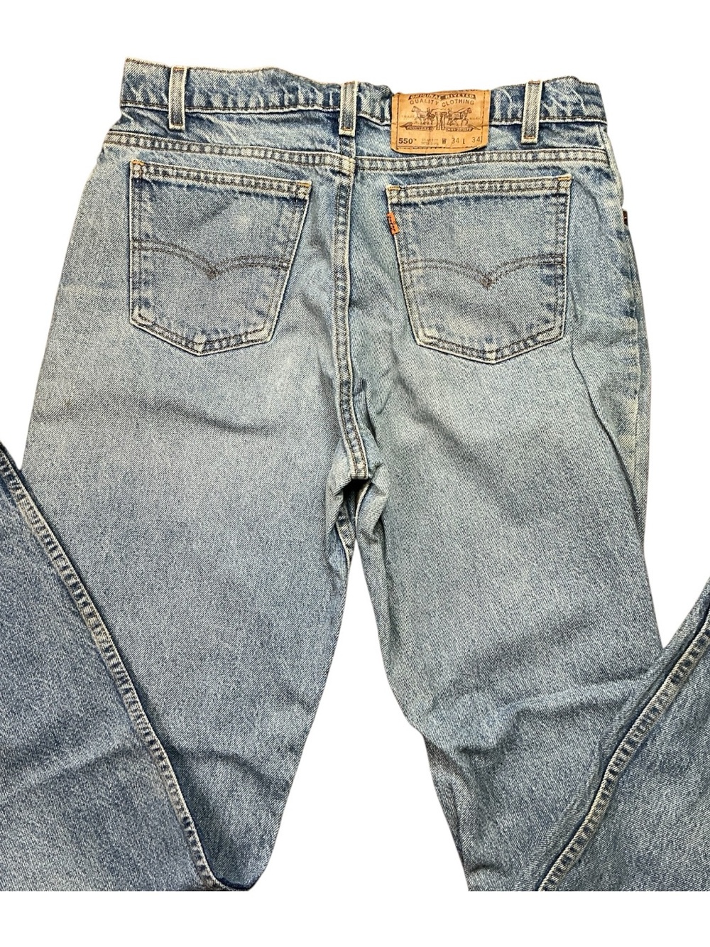 Vintage Levi’s 550 90s orange tab relaxed fit medium wash jeans 34 x 32 USA